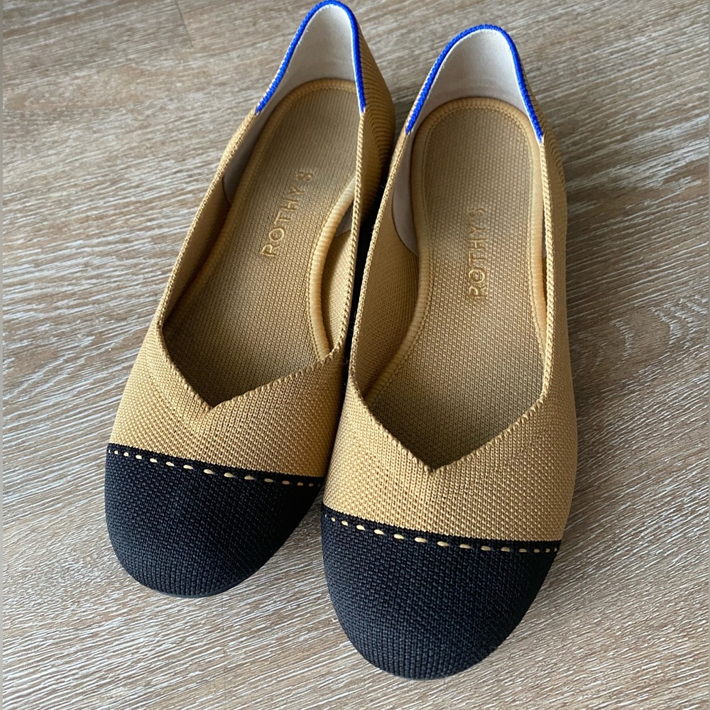 Rothy’s flats Black and Tan size 7.5